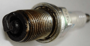 О чем говорит нагар на свечах зажигания и его цвет