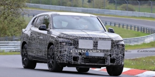 Гибридный BMW X8 вывели на трек